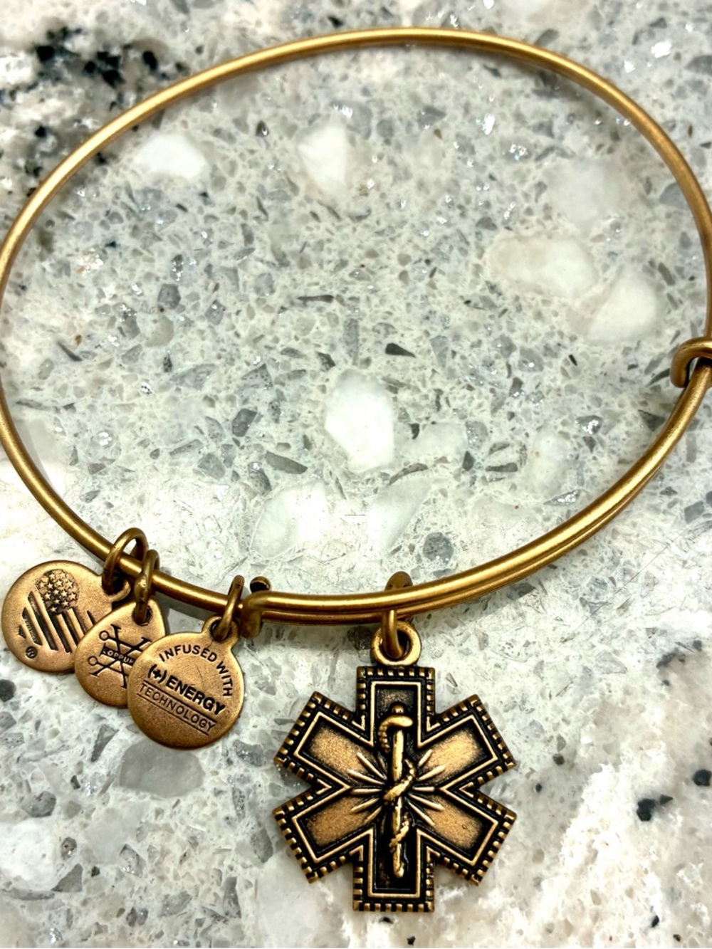 Preowned Alex and Ani gold tone bracelet medical charm